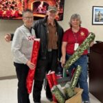 Wrapping paper donation - Jim (center) with Department President Gloria Covert (l) and VA & R Chairman LaVonne Matthews (r).