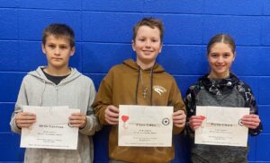 Pictured (l-r) Poppy Poster Winners: Adrian Guerrero (accepting for Alexia Guerrero), Chase Zabka, and Payton Elhard. Not pictured is Judith Jaeger.