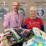 Stephen Sanders (on left), Specialist, Center for Development and Civic Engagement (VAMC Volunteer Services) and Theresa Gross, member/volunteer Unit 297 Harwood.