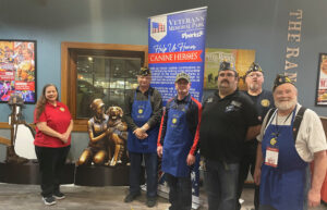 Volunteers pictured (l-r): Erica Claus-Numsali, Auxiliary District 2 Vice President pictured with Grand Forks Post 6 members J P Hricak, 2nd Vice Commander; Tim Gagnon, Son’s Department Sergeant at Arms; Ryan Kaste, First Vice Commander; Shawn Gunderson, member; and Gary Spicer, Third Vice Commander. Not pictured: Past Post 6 Commander Robert "Bob" Greene.