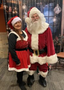 Erica Claus-Numsali (left) and Gary Spicer as Mr. and Mrs. Claus