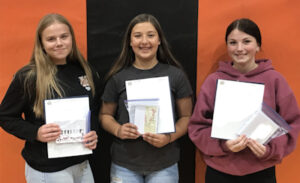 Students with winning poppy posters. Pictured (l-r): Jenna Homola, Emma Heller, and Courtney Remboldt. Article and photo submitted by Elaine Ackerman, Unit 250 President.