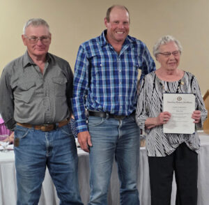 Elaine Lange (right) pictured with two family members during the Past Presidents Parley Luncheon at Department Convention.