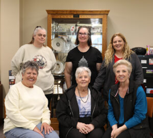 group photo with six people - Judges for 2026 Poppy Poster contest. Back (l-r): CherylGustafson, Poppy Co-chairman; Carol Wolf, Poppy Chairman; and Candace Berg, Department President. Front (l-r): Marcy Schmidt, Department Secretary; Donna Kolden, ND local artist; and Deb Bendickson. Photo submitted by Candace Berg